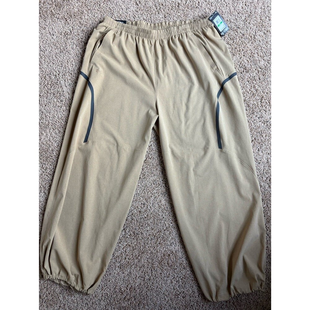 Under Armour Unstoppable Over Sized Womens Wind Pants NWT Large Tan MSRP $100